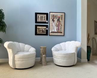 Pair of white swivel chairs