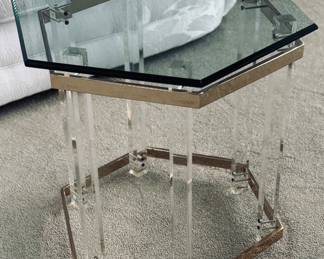 Lucite, glass, and brass table.
