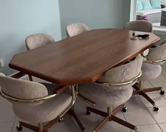 Dinette set with six rolling chairs