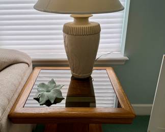 One of a pair of  end tables and vintage lamps. They match the coffee table.