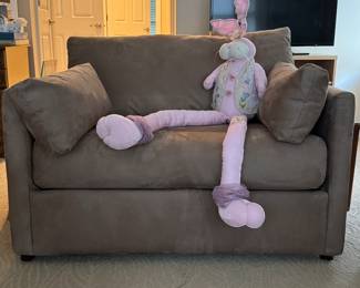 Micro suede chair and a half that converts to twin bed sleeper.