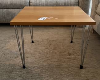 One of two square tables with hairpin legs