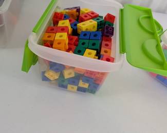 Colorful Linking Cubes / Unifix Cubes in Storage Bin: A large collection of durable, colorful linking cubes (also known as Unifix or snap cubes), housed in a convenient storage container. These essential educational manipulatives are perfect for teaching early math concepts (counting, patterning, graphing, basic operations), developing fine motor skills, and encouraging open-ended construction. A must-have for any classroom or homeschool.