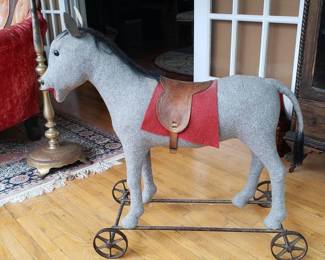 Steiff talking toy donkey. Believe to be recovered. Original saddle and base.