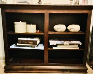 Ashery Oak is known for producing solid wood furniture with a focus on durability and traditional craftsmanship. Their pieces often feature clean lines and a timeless aesthetic, making them suitable for a variety of home decor styles. Ashery Oak furniture is typically made from high-quality oak, known for its strength and distinctive grain patterns.
Their bookcases are designed to be both functional and visually appealing, providing ample storage space while also serving as a decorative element in the room. The dark finish on this particular bookcase is a common choice for Ashery Oak, adding a touch of elegance and sophistication. Given the manufacturer and the apparent quality, the value is slightly higher than a generic modern bookcase.