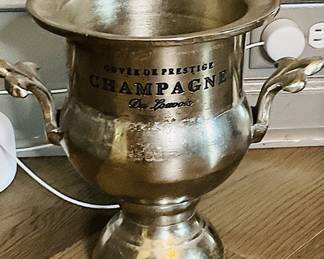 Vintage "Cuvée de Prestige Champagne Du Louvois" ice bucket.
