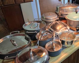 Nearly new set of cookware and vintage roasting pans.
