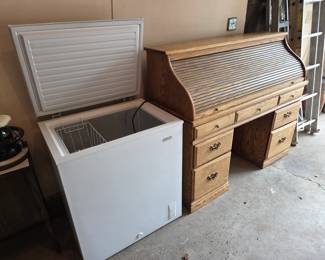 Chest freezer and Roll Top Desk.