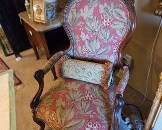 mid-19th Century French country Boudoir Armchair  Casters on the front cabriole legs and not on the straighter back legs. includes decorative antique throw pillow           26" W  x  41"H x 21"D     Seat  H 17.5"   $600