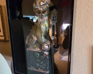 Framed behind slide-up door Foo Dog with display case  $35