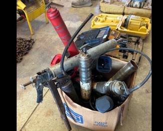BOX OF GREASE GUNS
