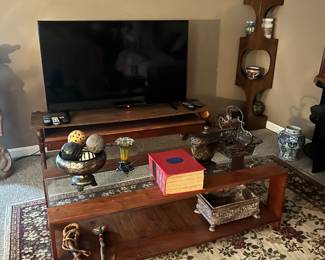 Notice the table with the TV, it is also solid wood hand made .  The coffee table is as well.