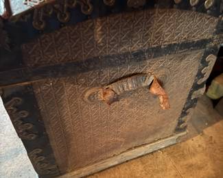 side of antique trunk
