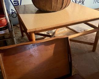 The treasures found in the lower level like this coffee table, basket and tray are valued vintage!