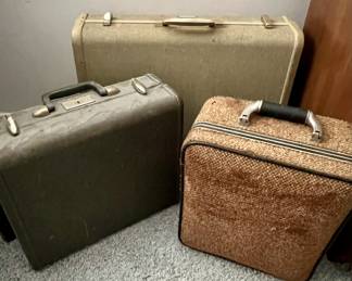 Vintage suitcases -- oh the travels they've seen but ready for more!