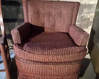 This upholstered swivel chair is medium size and perfect for relaxing...