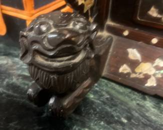 Foo Dog on each side of the stand