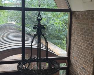 I’m going to try to get a better picture. This is a very large iron fixture. It’s been there since the house was built. It is stunning. Designer