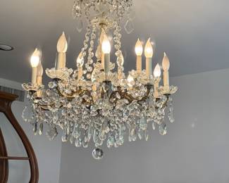 The largest of the crystal chandeliers in the home….