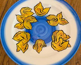 From a set of 3 oversized artist decorated plates