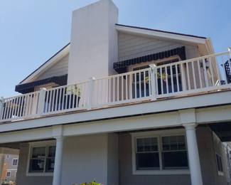Limited amount of vinyl railing; 6 ft. fixed awnings over sliding glass doors