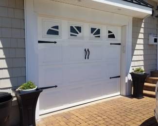 Garage door; hardscape driveway pavers