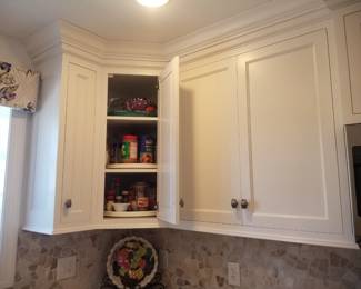 Amish-built custom cabinetry is white; full wood box construction with self-closing doors & cabinets