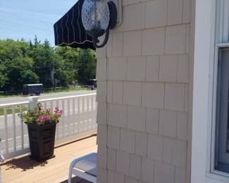 Cedar Impressions siding; exterior light fixtures