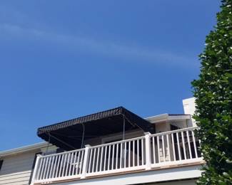 Limited amount of vinyl railing; fixed awning