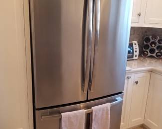 GE Profile refrigerator model PWE23KSKGSS