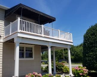 Limited amount of vinyl railing; fixed awning