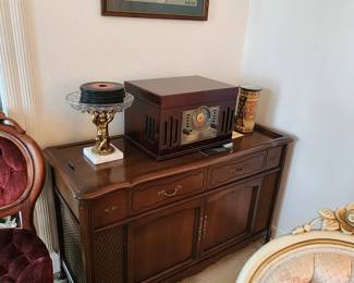Old stereo cabinet, Original art work by owner hanging on wall