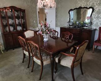 Dining room set.  Table has 3 leaves, and  cover pad
