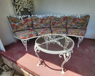 Patio settee (two separate pieces sold separately) and a metal patio coffee table