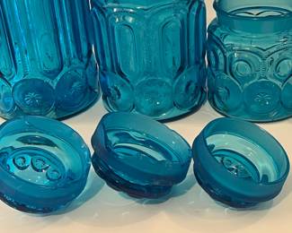 R20 - $45. Glass Canister Set. Some chipping - see photos. Still great colorful decor pieces!