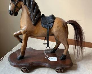R68 - $100. Antique Hand Carved Wooden Horse Pull Toy with Metal Wheels and real horse hair tail.