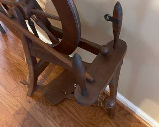 R127 - $100 Small Wooden Spinning Wheel. Includes what is in photograph.