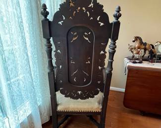 R82 - $125. Victorian Carved Hall Chair. Frame is sturdy but seat could use reupholstered. Measures 26.5" wide x 18" deep x 55.5" tall.