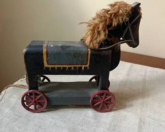 R69 - $45. Pull Horse Toy with metal wheels.