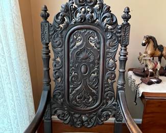 R82 - $125. Victorian Carved Hall Chair. Frame is sturdy but seat could use reupholstered. Measures 26.5" wide x 18" deep x 55.5" tall.