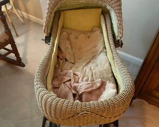 R112 - $65. Antique Wicker Carriage.