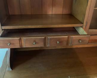 R110 - $60. China Cabinet. Drawers all slide. Moves in 2 pieces. Does have a broken glass panel on the top. Great project piece!
