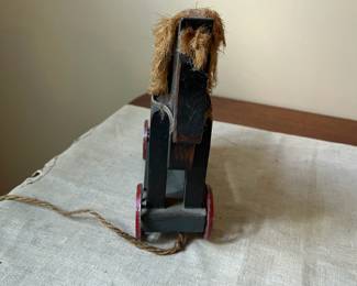 R69 - $45. Pull Horse Toy with metal wheels.