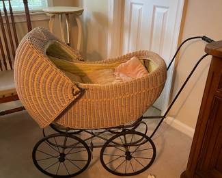 R112 - $65. Antique Wicker Carriage.