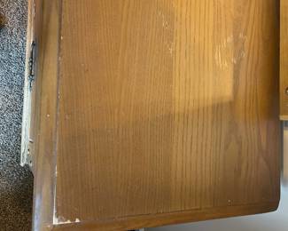 R143 - $50. Dresser with mirror. Drawers all slide but it does have surface damage.
