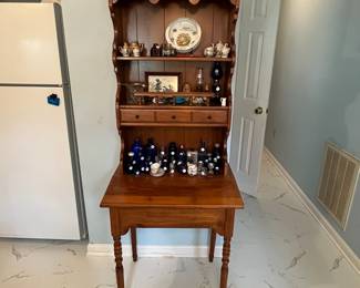 R88 - $125. Secretary Desk with Shelves for Display. Measures 28" wide x 19" deep x 70" tall. Moves in 2 pieces.