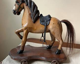 R68 - $100. Antique Hand Carved Wooden Horse Pull Toy with Metal Wheels and real horse hair tail.