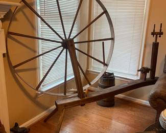 R128 - $150. Large Wooden Spinning Wheel from the late 1700s.