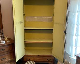 R142 - $125. Cute Antique Armoire with shelves inside for storage.