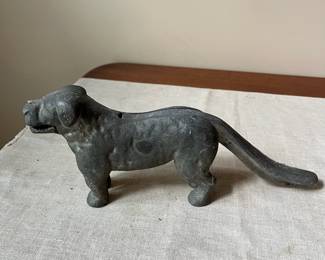 R63 - $20. Cast Iron Dog Nutcracker.